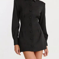 Black blazer mini dress with pointed collar, long sleeves, and buttoned front panel.