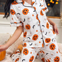 Halloween pajama set: white short-sleeve button-up shirt with pocket and pumpkin prints