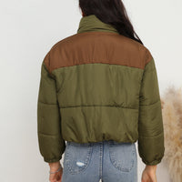 Women's puffer coat back view in army green with brown yoke and stripe panel