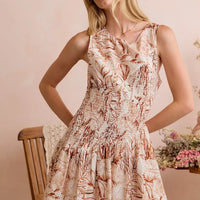 Taupe shell print smocked sleeveless mini dress with tiered fit-and-flare