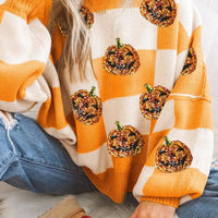 Tangerine and white checkered round-neck long-sleeve sweater with pumpkin sequin patches