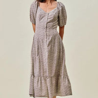 Ditsy floral midi dress front view, square neckline, puff sleeves, elastic waist