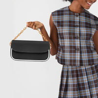 Black mini shoulder bag with flap and gold chain-link shoulder strap