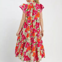 Floral tiered midi dress back view with cap sleeves and gathered tiers