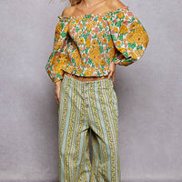 Floral off-shoulder smocked blouse with elastic neckline and long puff sleeves