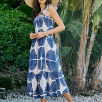 Navy and white abstract print tiered midi dress with smocked bodice, sleeveless