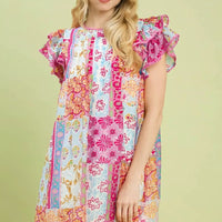 Pink patchwork mini dress with flutter sleeves and ruffled round neckline