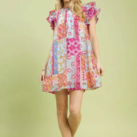 Pink patchwork mini dress with ruffled flutter sleeves and short hem