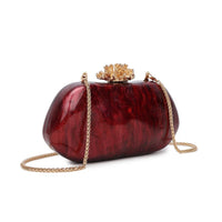 Burgundy box clutch bag with ornate gold top clasp and braided chain strap