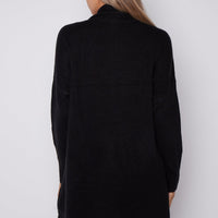 Black fringed shawl-collar cardigan, back view with long sleeves and tassel hem