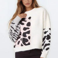 Ivory knit jumper with spotted and zebra-striped graphic panels, ribbed cuffs and hem