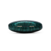 Emerald green oval marble-effect clutch bag, top view with gold hinged clasp