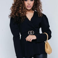 Black puff-shoulder V-neck blouse with ring belt detail and peplum hem