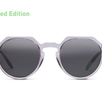 Round sunglasses with transparent gray frame and dark lenses, front view