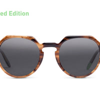 Brown tortoise-effect sunglasses with dark round lenses, front view