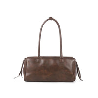 Dark brown faux leather tote-style shoulder bag with top handles and fringe ties