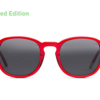 Red round sunglasses with dark tinted lenses, glossy frame and keyhole bridge