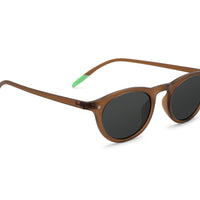 Kilda toffee sunglasses angled side view, brown frame with dark oval lenses