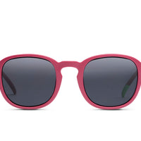Raspberry sunglasses with dark round lenses and pink frames