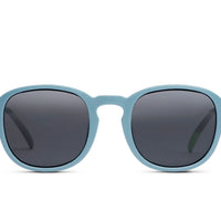 Steel blue round sunglasses with dark lenses and slim arms
