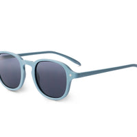 Steel blue sunglasses side view with dark lenses and green-tipped arms