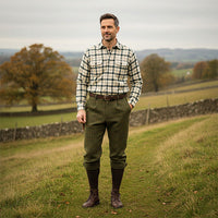 Men's dark sage tweed breeks shown from the front, with turned-up cuffs