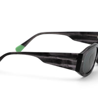 Tayrona smokey black sunglasses, side view with green tinted lenses and dark frame