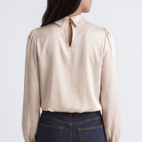 Champagne satin-look blouse back with keyhole neck opening and gathered shoulders