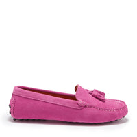 Pink suede driving loafer with tassel detail and a moccasin toe seam.