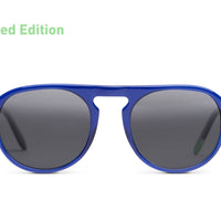 Indigo blue sunglasses with dark oval lenses and keyhole bridge