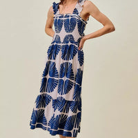 Navy abstract print tiered midi dress with smocked bodice and ruffle-trim straps