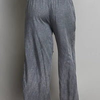 Charcoal wide-leg woven pants, elastic waistband, relaxed straight legs