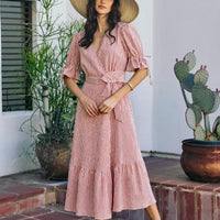 Red-and-white striped wrap midi dress, V-neck and tied waist, short puff sleeves