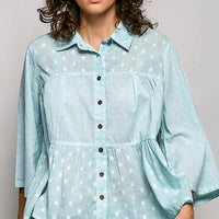 Aqua button-front peplum shirt with white polka dots, long sleeves and point collar
