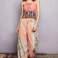 Pink lace-up tank top with lace detail and tassel fringe hem