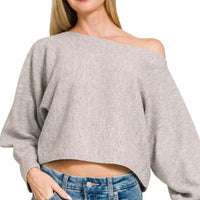 Grey boat-neck knit sweater with off-shoulder drape and balloon sleeves