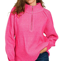 Hot pink ribbed half-zip sweater with tall collar, long sleeves, side view