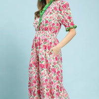 Floral tiered midi dress in pink mix with puff sleeves and green V-neck trim