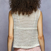 Textured open-back sleeveless vest with crochet-knit yoke and openwork panels.