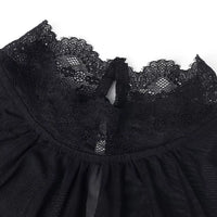 Black lace neckline with sheer yoke on a velvet blouse