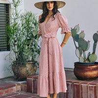 Red-and-white striped wrap midi dress with V-neck, tied waist belt, short puff sleeves