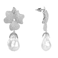 Silver textured flower drop earrings with hoop-like backs and white pearl