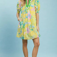 Lemon botanical print mini dress with V-neck and puff sleeves, smocked cuffs