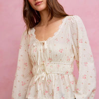 White floral clip-dot lace-trim ruched blouse with long puff sleeves and peplum silhouette