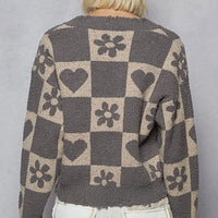 Women’s back view V-neck heart checkered sweater with long sleeves, gray/beige pattern.