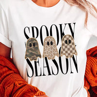 Women's white short-sleeve T-shirt with 'Spooky Season' ghost trio graphic