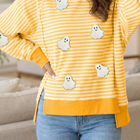 Yellow and white striped long-sleeve top with small ghost patches, crew neck
