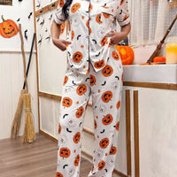 Halloween pajama set: white short-sleeve button-up top and pants with pumpkin prints