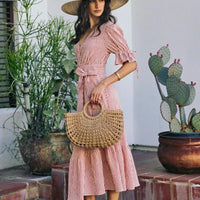 Red-and-white striped wrap midi dress with V-neck, short puff sleeves, tied waist
