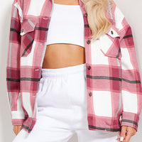 Women’s plaid shacket jacket in pink, white, and dark red with button front and pockets